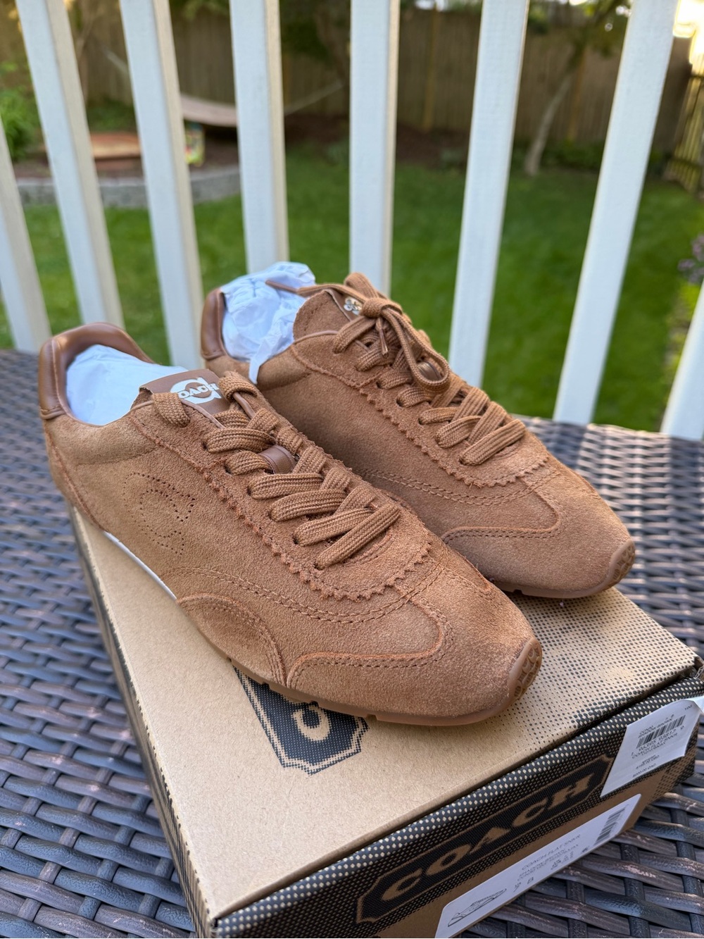 Coach women’s Tan Suede sneaker 7